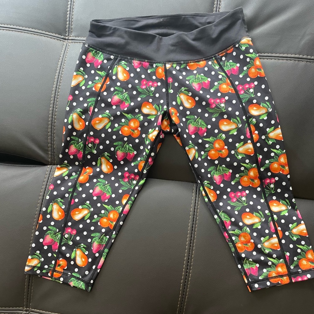 Betsey Johnson leggings with fruit on them.